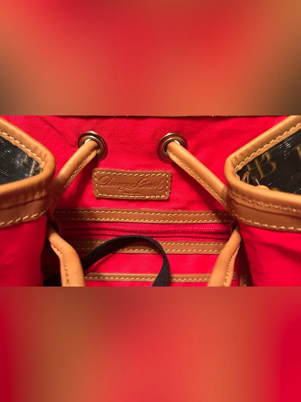 Dooney & Bourke signature brown 1975 DB logo coated canvas bucket bag
